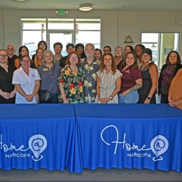 a group of people in a large room