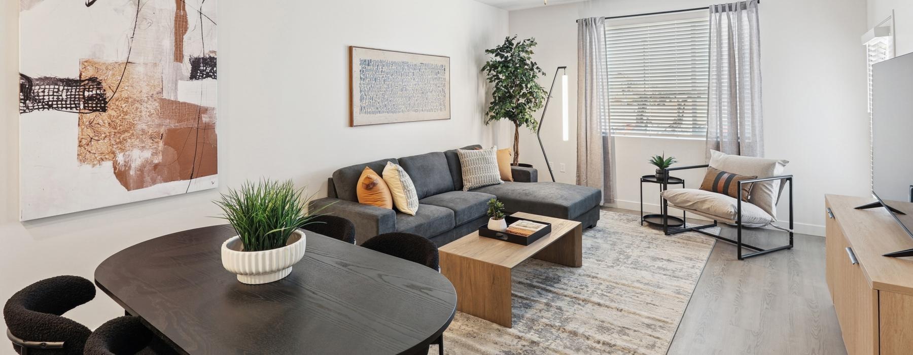 a living room with a couch and a table