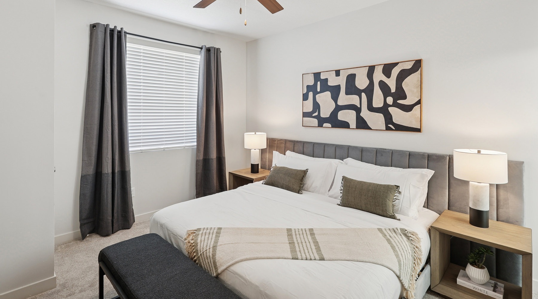 Bedroom with natural lighting and high ceilings