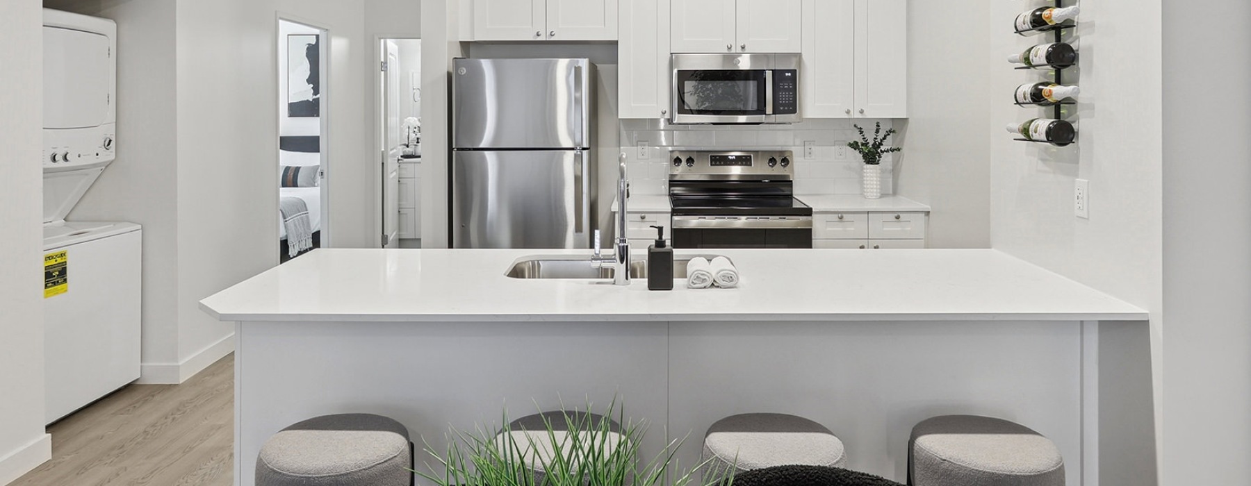 kitchen with white cabinets and island