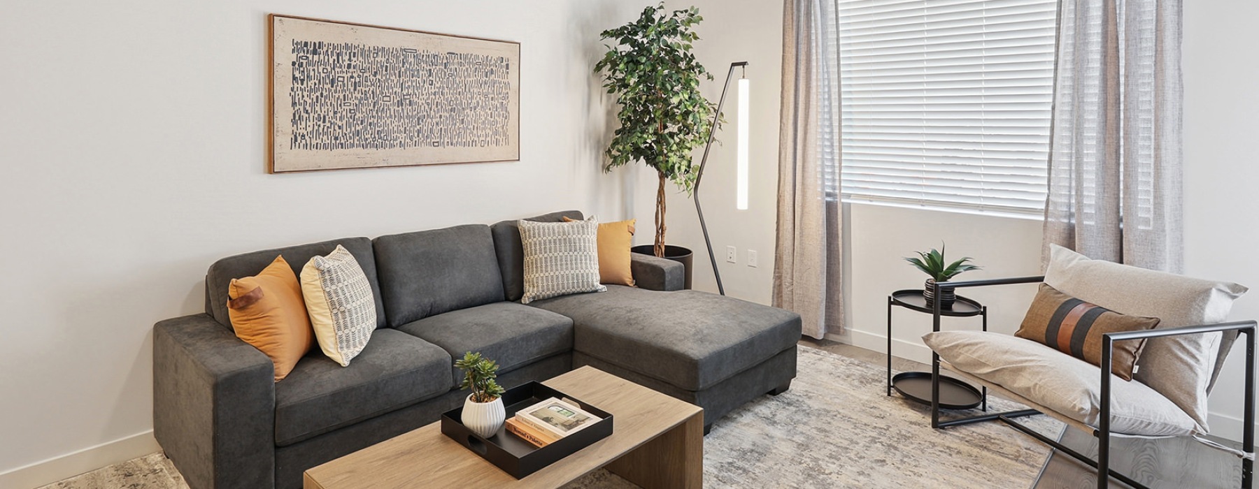 living room with couch coffee table and chair